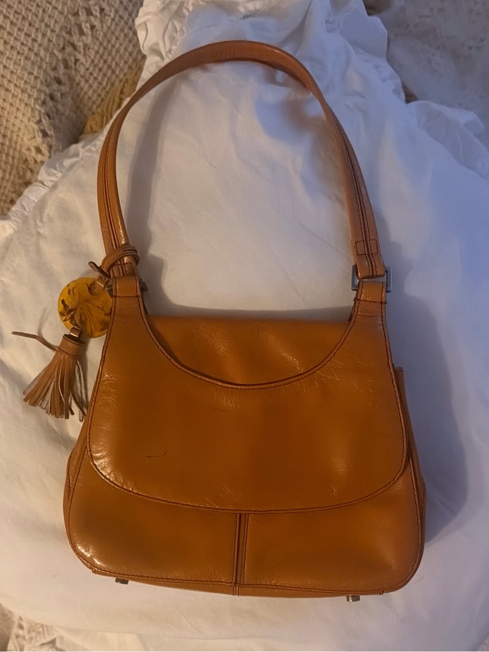 HOBO Tan Leather Shoulder Bag with Tassel Charm